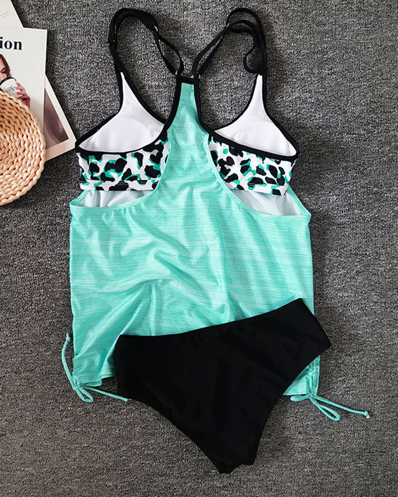 Fabiola | Effen tankini met subtiele panterprint